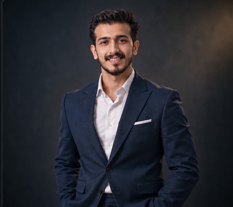 Jawad Khan in a navy suit